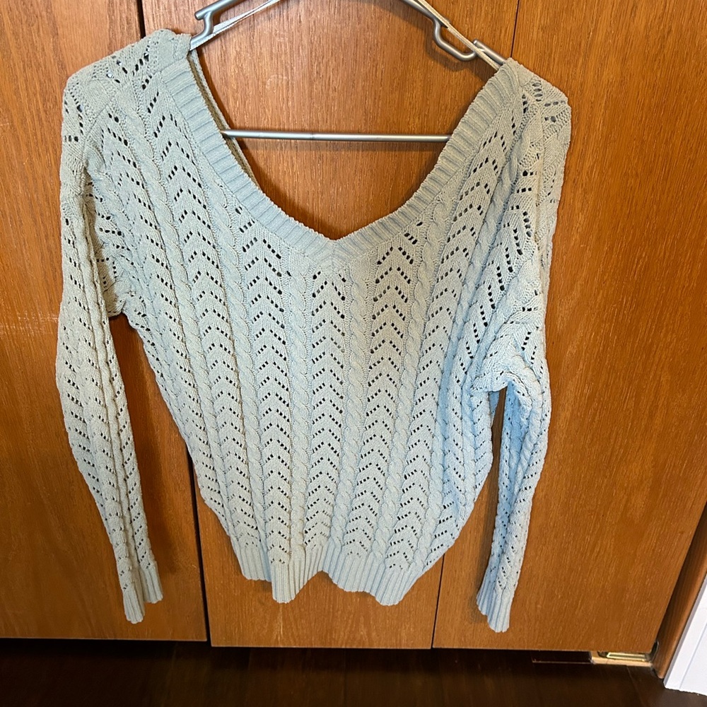 Sweater with twist back detail
